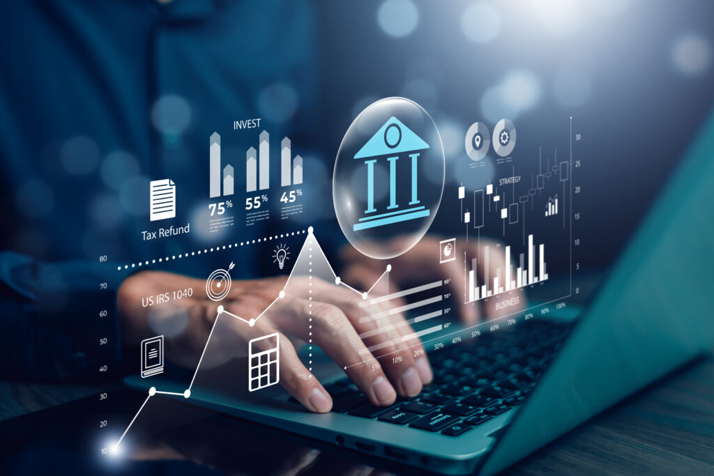 Businessman using the laptop with bank and tax icons,Concept of tax payment optimisation business finance